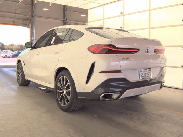 2025 BMW X6 xDrive40i (MSRP $82,000)